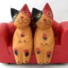 cat/red sofa