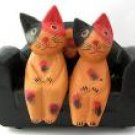 cats/ black sofa
