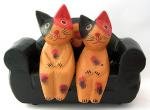 cats/ black sofa