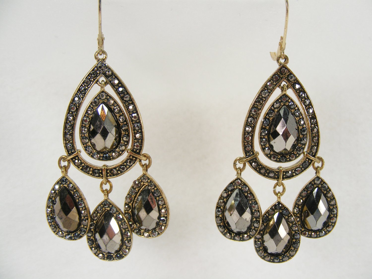 Avon Embellished Hematite Colored Chandelier Earrings. Antique Goldtone