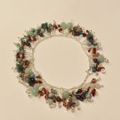 Agate, jasper, and garnet charm bracelet