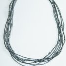 Multi strand hematite and black bead necklace