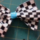 checkerd ans blue bow clip