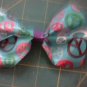peace and purple bow clip