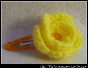 Crocheted small rose - yellow