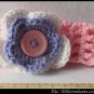 Crocheted headband with layered flower for baby
