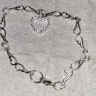 Silver heart charm on hearts bracelet