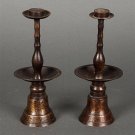 Pair of Chinese patinated metal altar candlesticks