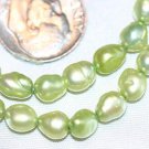 GREEN FRESHWATER PEARL BEADS -16 INCH STRAND