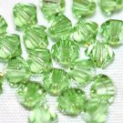 12 SWAROVSKI CRYSTAL PERIDOT- 4MM BICONE BEADS