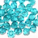 12 SWAROVSKI CRYSTAL BLUE ZIRCON- 4MM BICONE BEADS