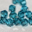 12 SWAROVSKI CRYSTAL INDICOLITE- 4MM BICONE BEADS