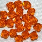 12 SWAROVSKI CRYSTAL SUN- 4MM BICONE BEADS