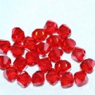 12 SWAROVSKI CRYSTAL LIGHT SIAM- 4MM BICONE BEADS
