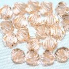 12 SWAROVSKI CRYSTAL LIGHT PEACH- 4MM BICONE BEADS