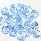 12 SWAROVSKI CRYSTAL LIGHT SAPPHIRE- 4MM BICONE BEADS