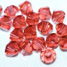 12 SWAROVSKI CRYSTAL PADPARADSCHA- 4MM BICONE BEADS