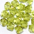 12 SWAROVSKI CRYSTAL LIGHT OLIVINE- 4MM BICONE BEADS