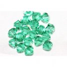 12 SWAROVSKI CRYSTAL LIGHT EMERALD- 4MM BICONE BEADS