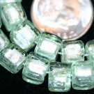 GREEN FOIL CUBE GLASS BEADS-14 INCH STRAND