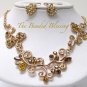 GOLD AUSTRIAN CRYSTAL FLOWER BLOSSOM NECKLACE AND EARRING SET