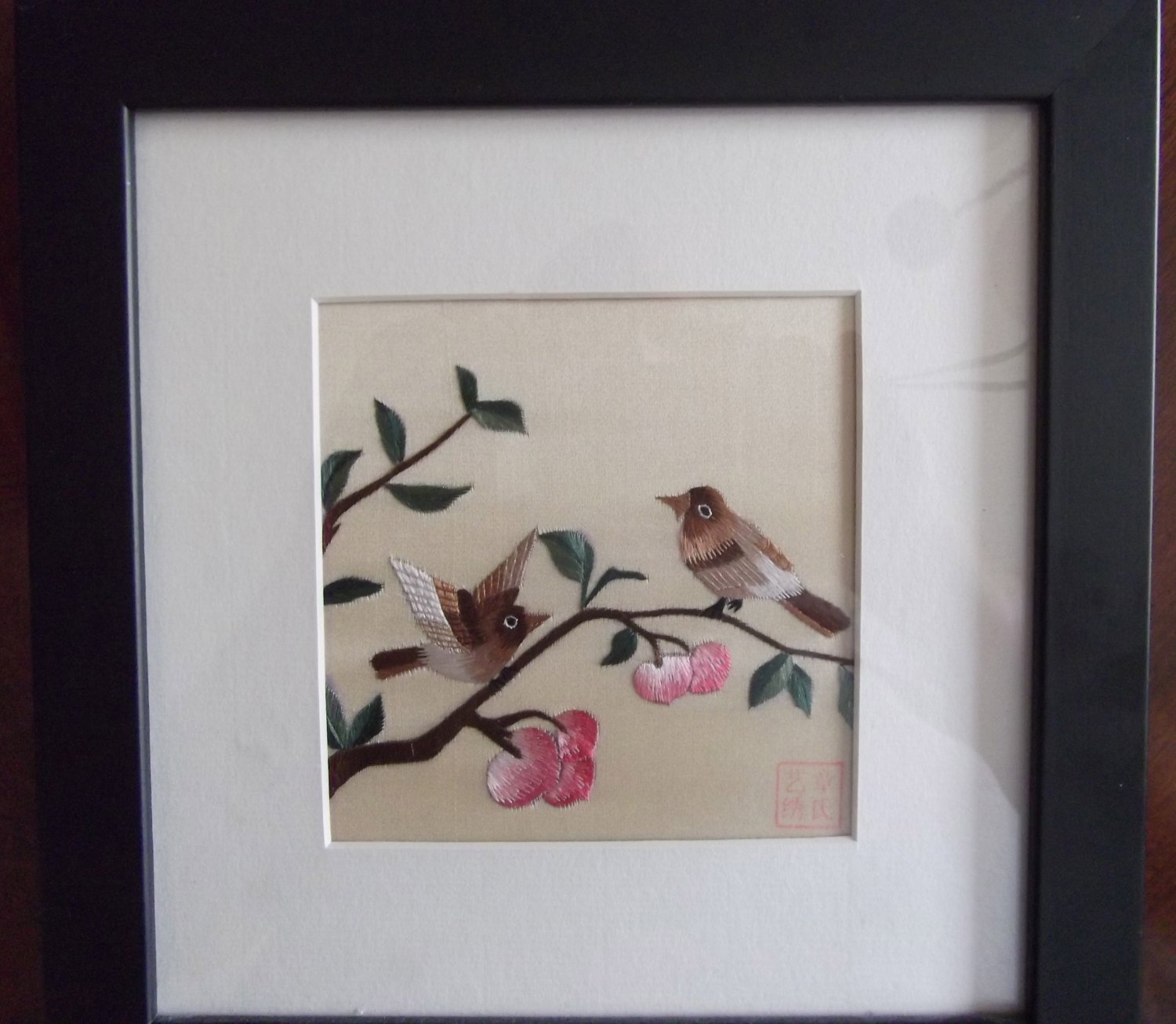 2 birds on a branch
