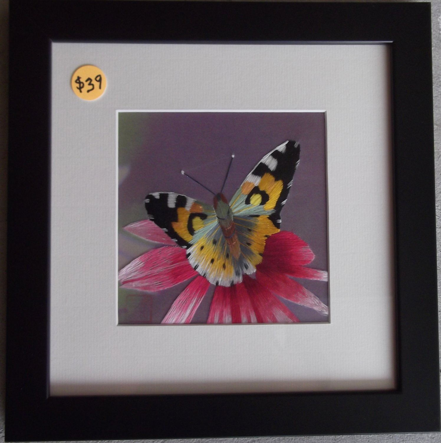 Butterfly on pink and red flower