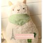 White Alpaca Wears White and Green