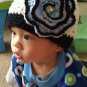 shell beanie with large flower- child
