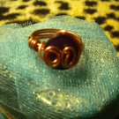 Purple button wire wrapped ring