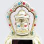 A Solar Powered Mani Prayer Wheel Air Freshener Mantra