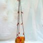 Hanging candleholder
