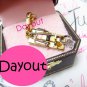 Authentic JUICY COUTURE Mousetrap Trap Gold Bracelet Charm YJRUO174 new in Box