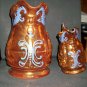 2 Antique Copper Luster Pitchers