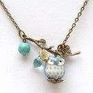 Antiqued Brass Leaf Turquoise Quartz Porcelain Owl Necklace