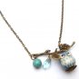 Antiqued Brass Leaf Turquoise Quartz Porcelain Owl Necklace