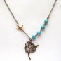 Antiqued Brass Tree Bird Green Turquoise Necklace