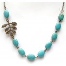 Antiqued Brass Leaf Green Turquoise Necklace