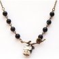 Antiqued Brass Leaf Black Agate Porcelain Owl Necklace
