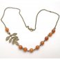Antiqued Brass Leaf Honey Jade Necklace