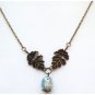 Antiqued Brass Leaf Porcelain Owl Necklace