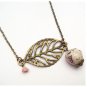 Antiqued Brass Leaf Porcelain Owl Necklace