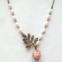 Antiqued Brass Leaf Pearl Porcelain Owl Necklace