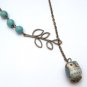 Antiqued Brass Leaf Turquoise Porcelain Owl Necklace