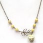 Antiqued Brass Leaf Lemon Jade Porcelain Owl Necklace