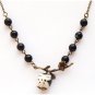 Antiqued Brass Leaf Black Agate Porcelain Owl Necklace