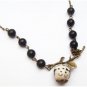 Antiqued Brass Leaf Black Agate Porcelain Owl Necklace