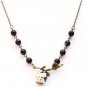 Antiqued Brass Leaf Black Agate Porcelain Owl Necklace