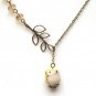 Antiqued Brass Leaf Quartz Porcelain Owl Necklace
