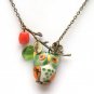 Antiqued Brass Leaf Coral Quartz Porcelain Owl Necklace